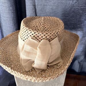 NWOT Imperial Classic Womans straw hat with cream ribbon and bow.